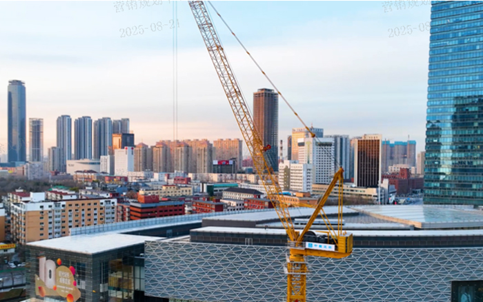 助建摩天双子塔 | js1996官网动臂塔机闪耀“云端”